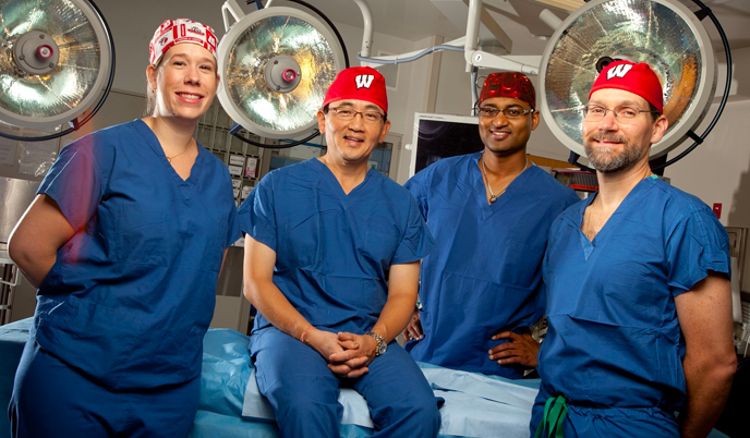 UW Health physicians smiling in an OR