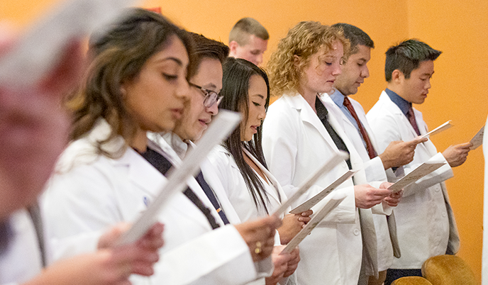 M1 students recite the Hippocratic oath at the white coat ceremony in 2023