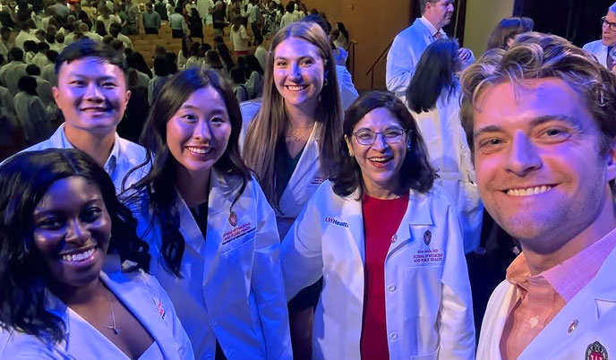 Dean Ahuja with new MD students at the White Coat Ceremony