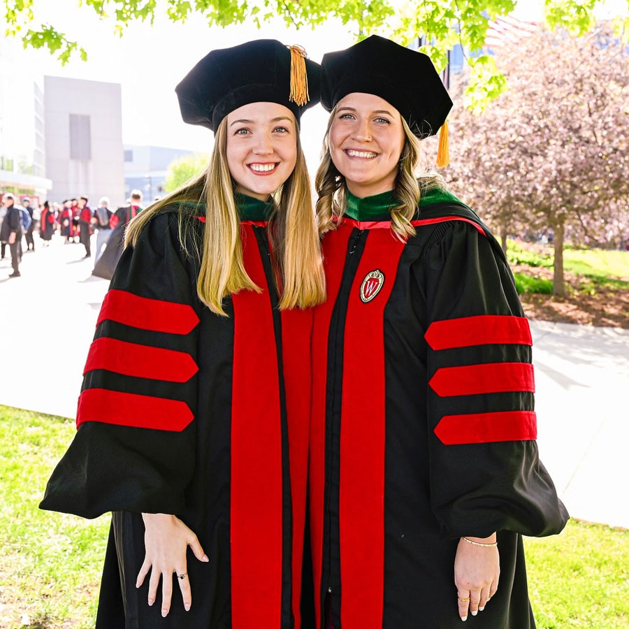 Graduates Lauren Hlubek and Sierra Block , who both finished their physician assistant studies, were all smiles outside the Kohl Center.