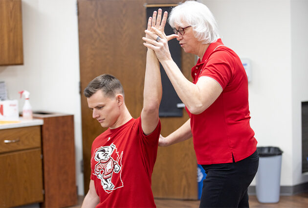 Faculty and students work closely to demonstrate and practice physical therapy