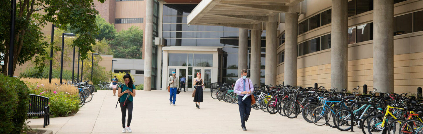 People walking outside on the medical campus