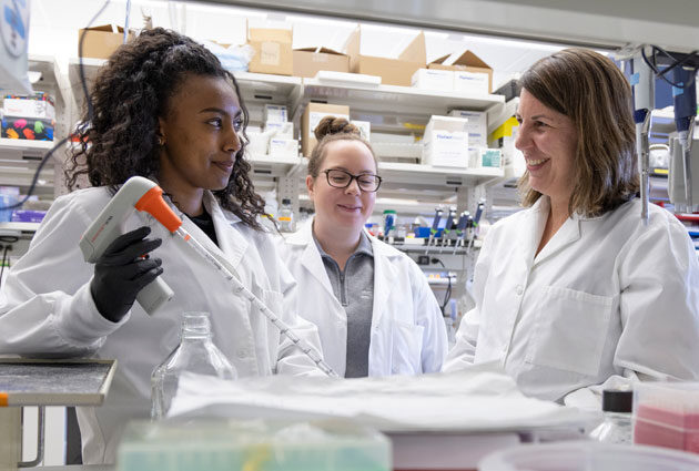Women working together in a research lab