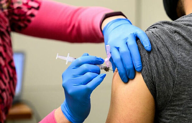 A person receiving a vaccination