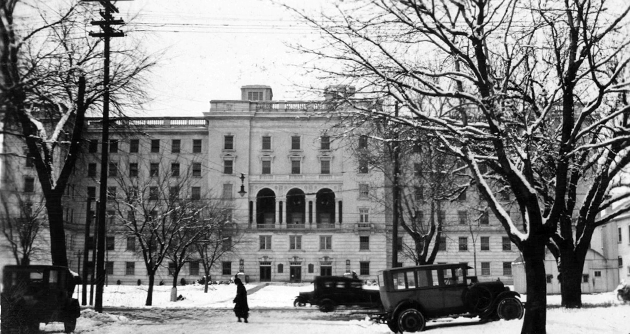 Wisconsin General Hospital on snowy day with cars out front ca. 1925