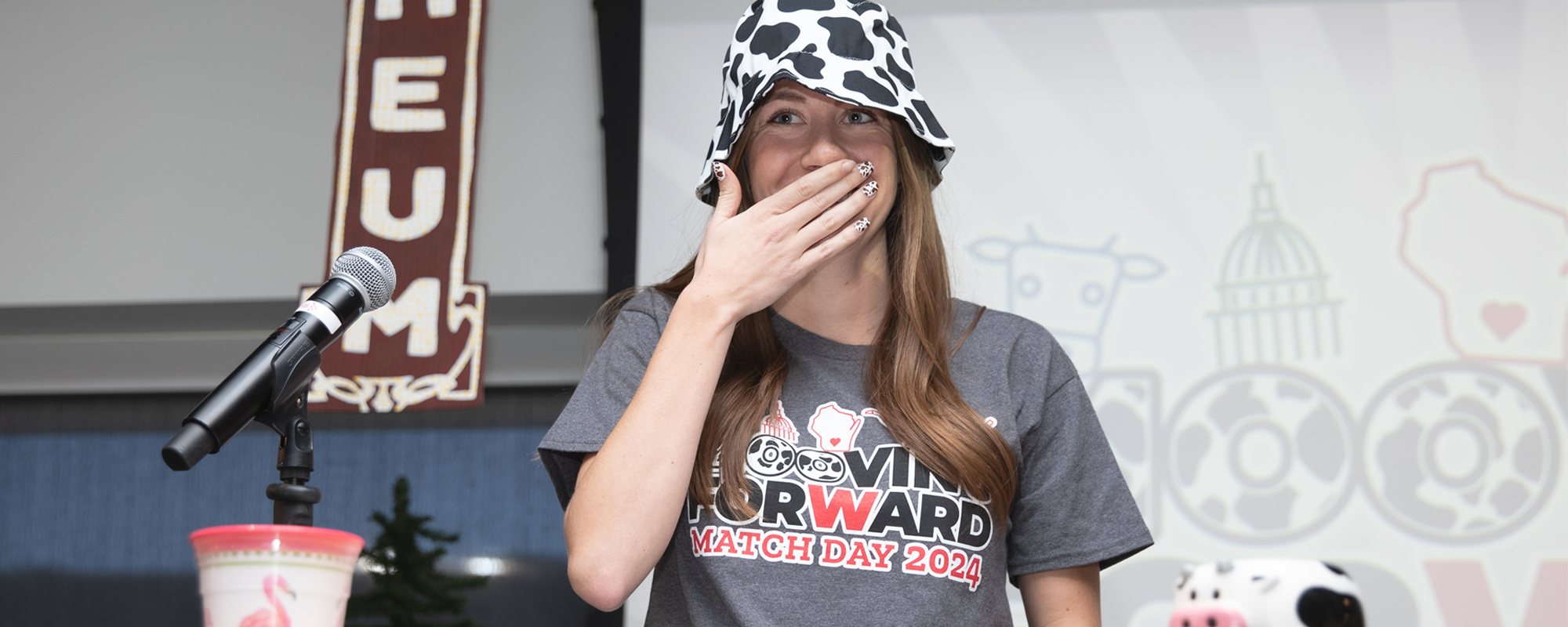 MD student wearing a cow patterned hat at Match Day 2024