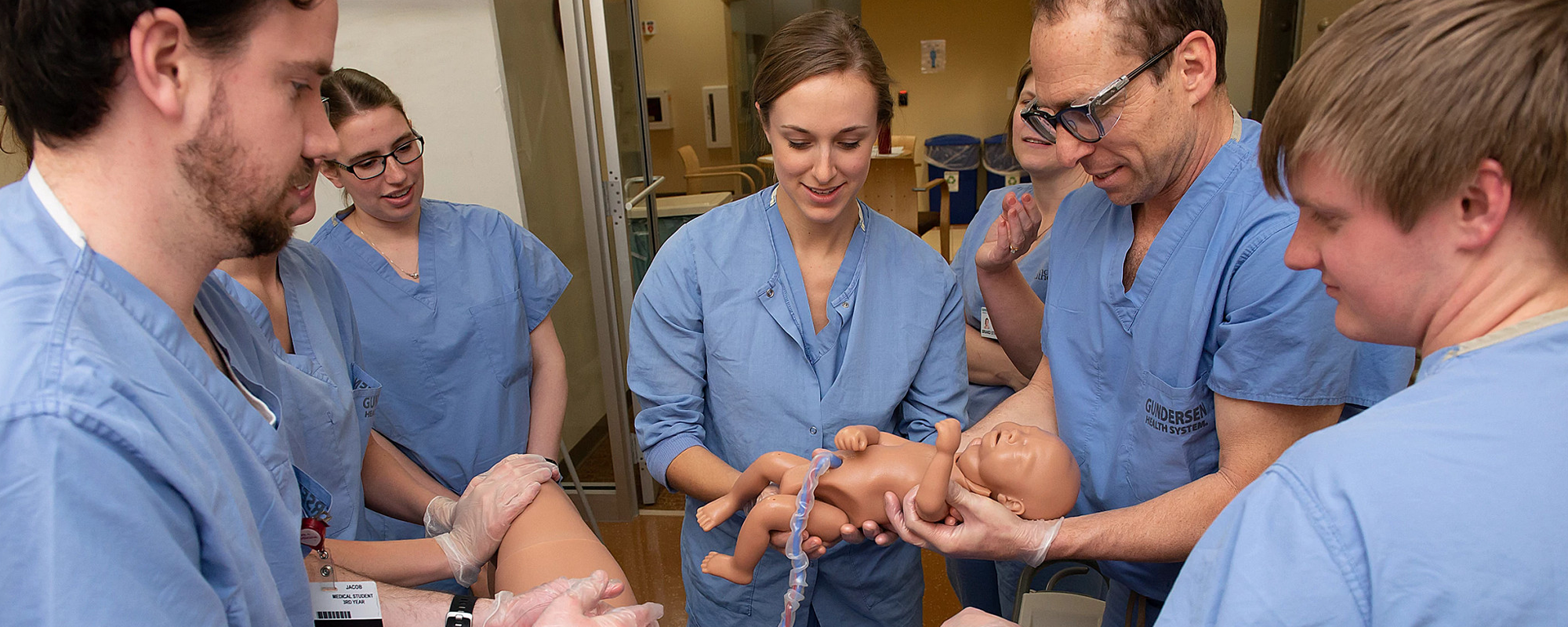 Rural medicine students practice delivering babies in a simulation lab in La Crosse, Wisconsin