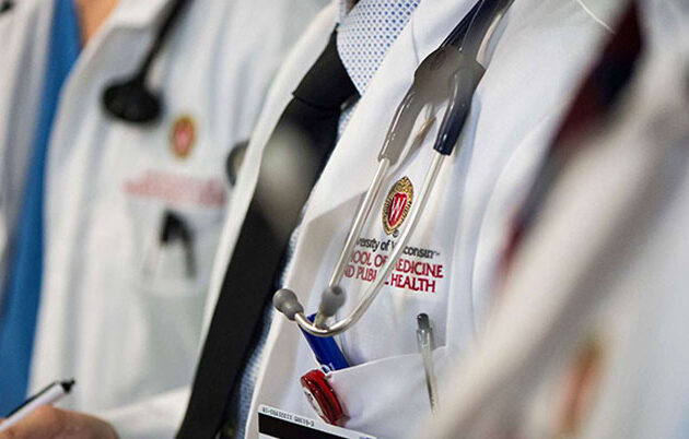 Doctors wearing a white coat