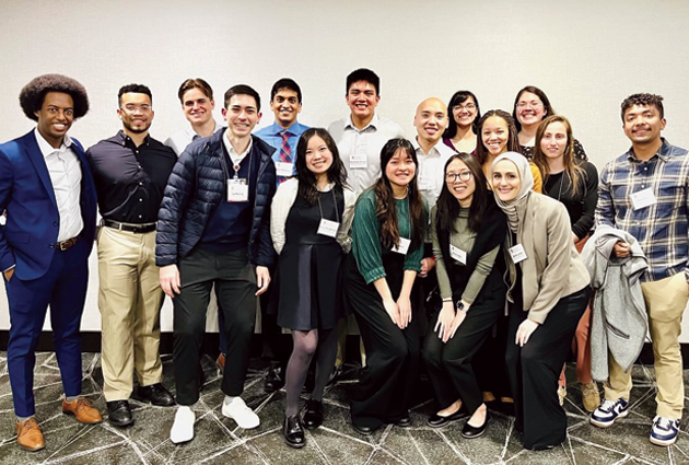 Group of smiling MD students