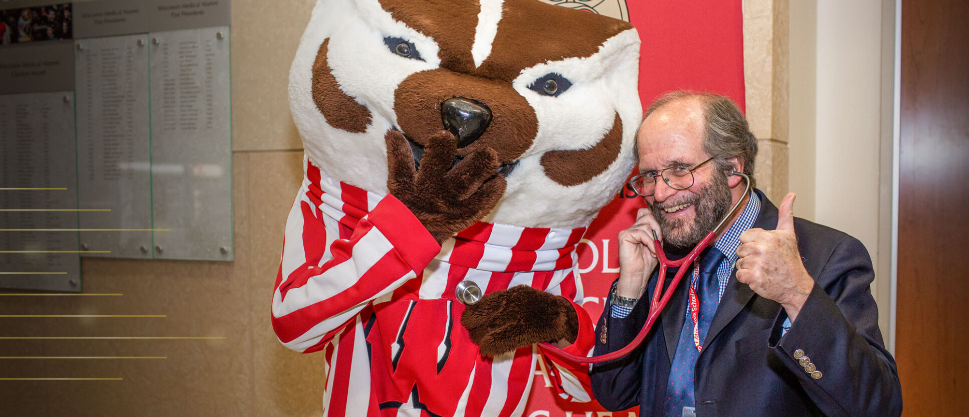 Dean Robert N. Golden with Bucky Badger