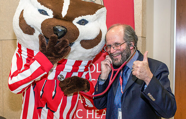 Dean Robert N. Golden with Bucky Badger