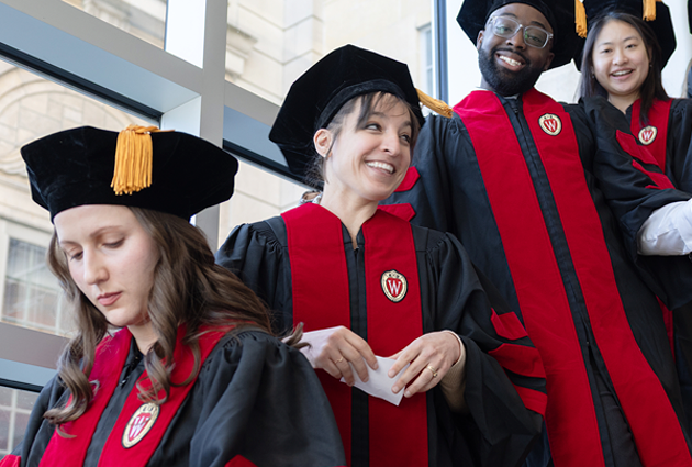 A group of students on graduation day in their cap and gowns