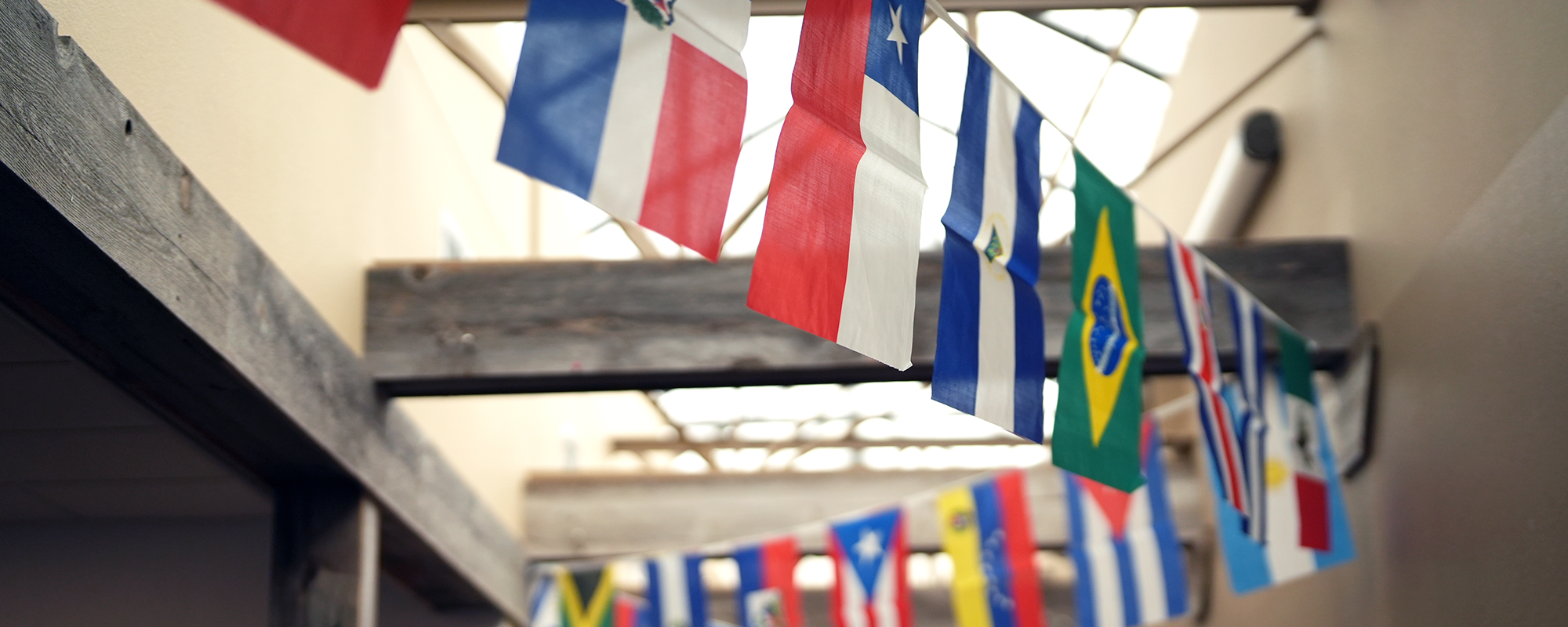 Flags draped across the rafters of the UCC senior center