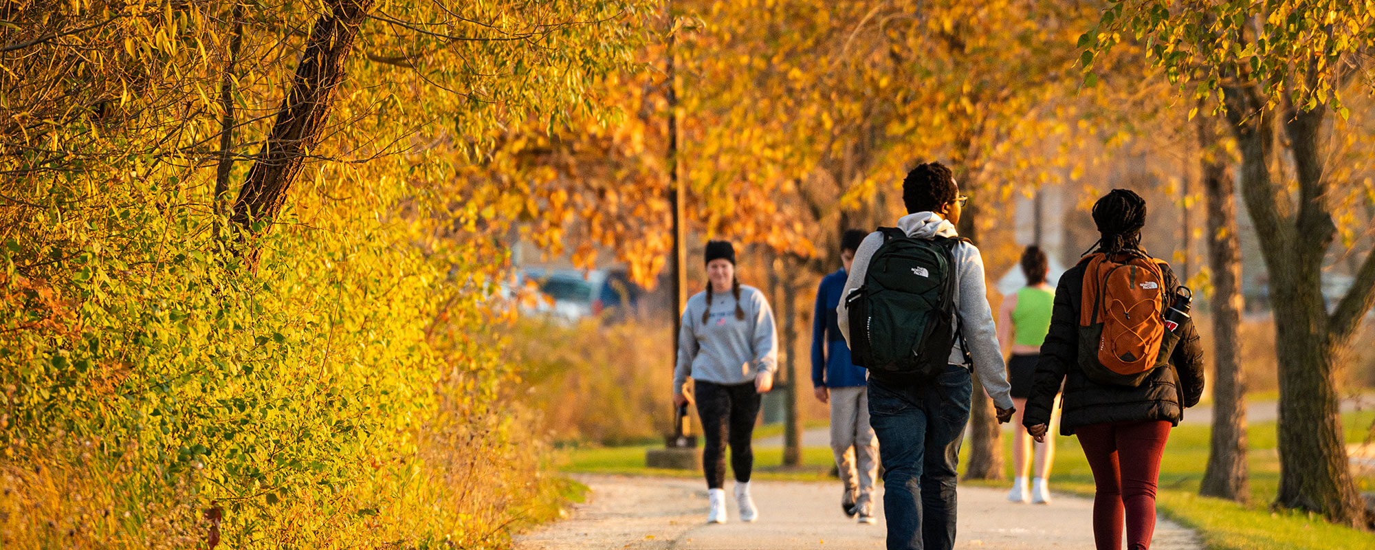 Students walking on Lakeshore Path
