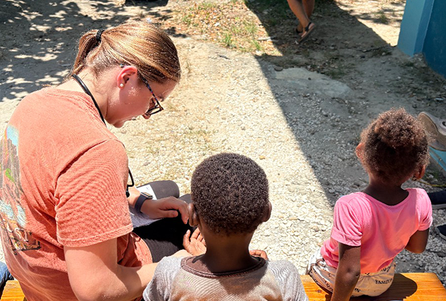 A PA student working with children