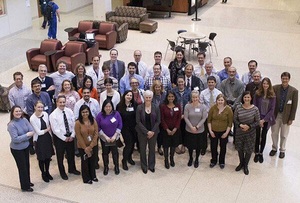 A group of faculty posing together