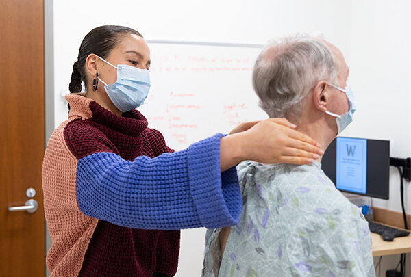 A student practicing their skills on a patient