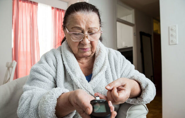 woman checking her insulin levels