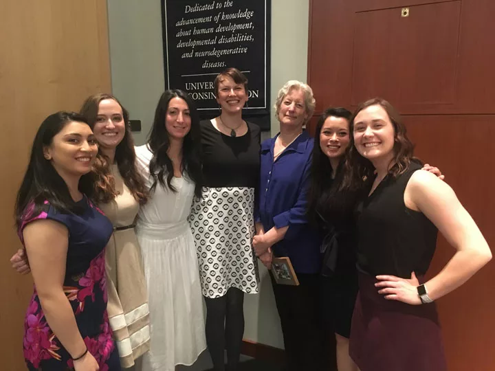A group of genetic counseling students at graduation